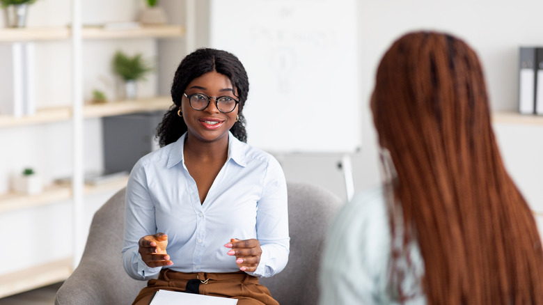 Woman consulting with her doctor