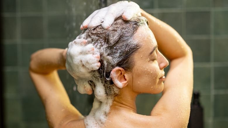 person washing their hair