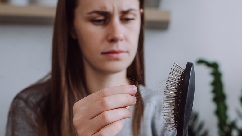 Brush Vs. Comb: Which Is Actually Right For Your Hair?