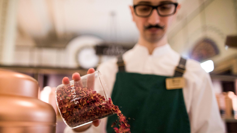 chef using rose petals