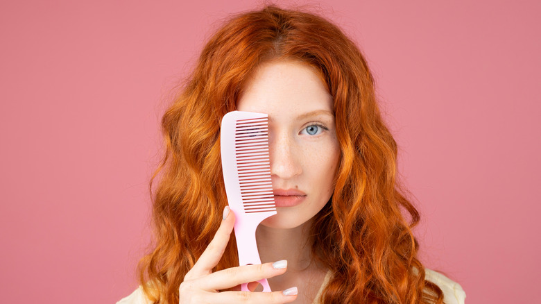 Woman with wavy red hair