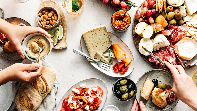 People eating appetisers together