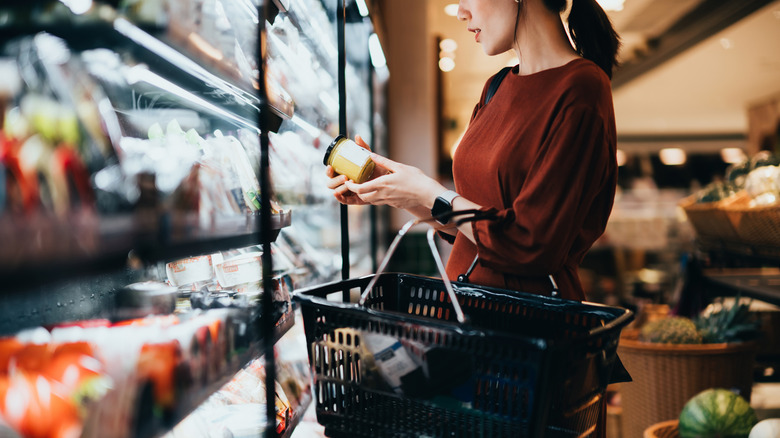 A woman buying groceries