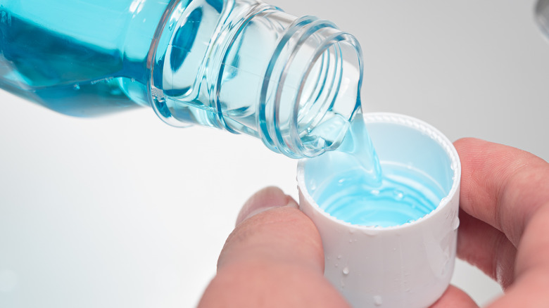 mouthwash poured into cap