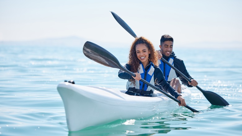 woman and man kayaking