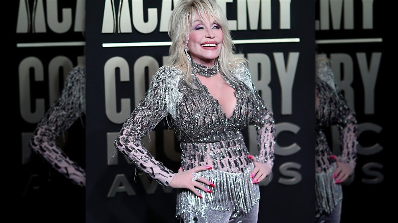 Dolly Parton in silver jumpsuit at ACM Awards