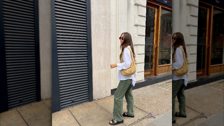 Woman carrying slouchy bag.