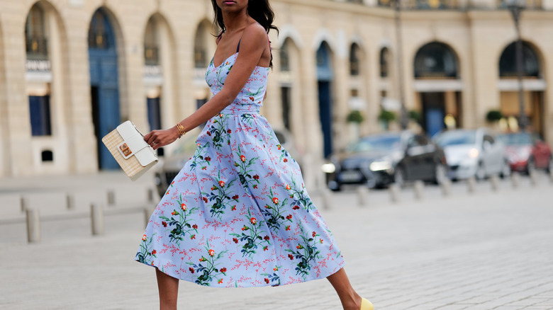 Girl wearing a summer sun dress.