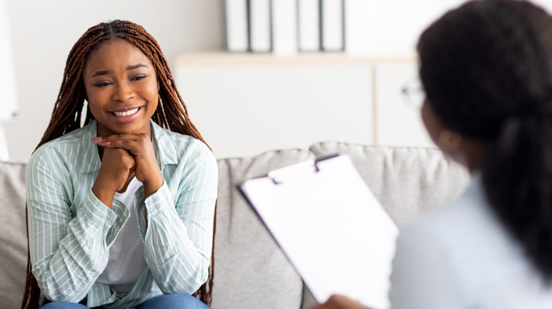 happy woman in therapy session