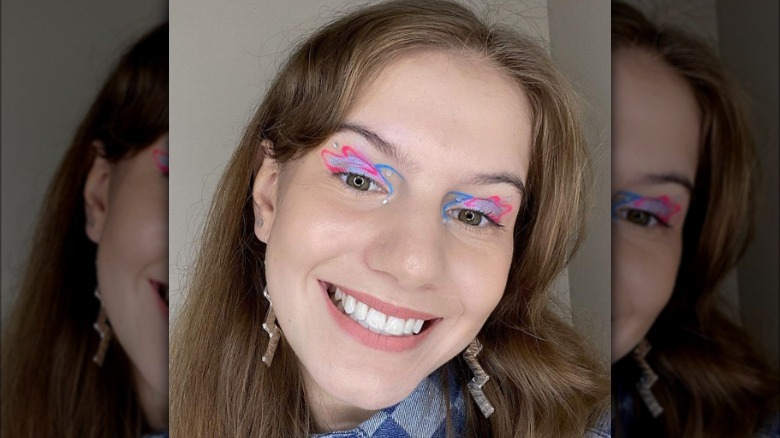 A woman with funky colorful eyeliner