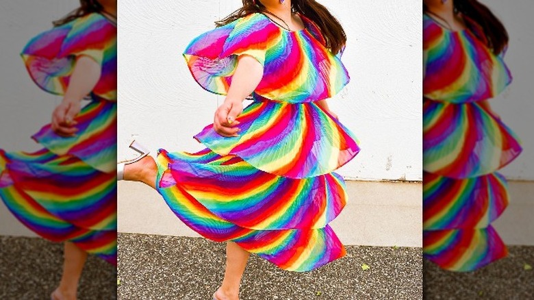 Woman in layered rainbow dress 