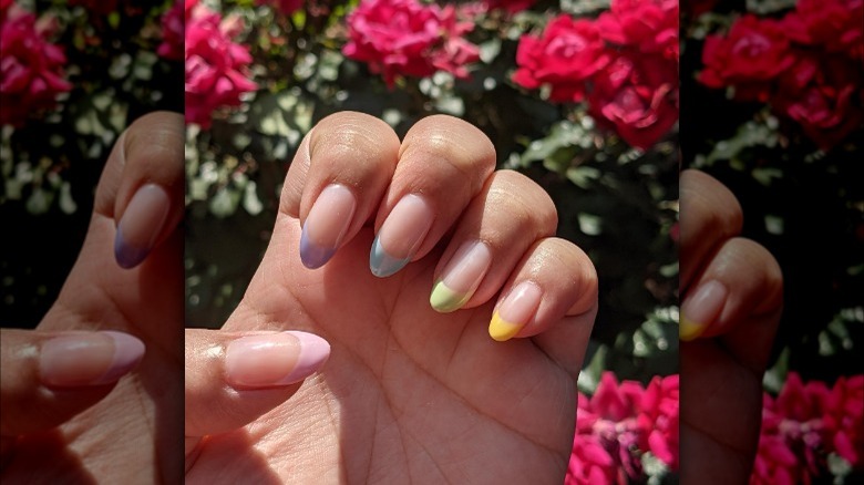 Almond shaped pastel French tip nails 