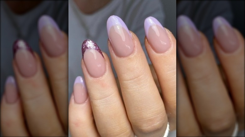 Purple french manicure with glittery accent nail 