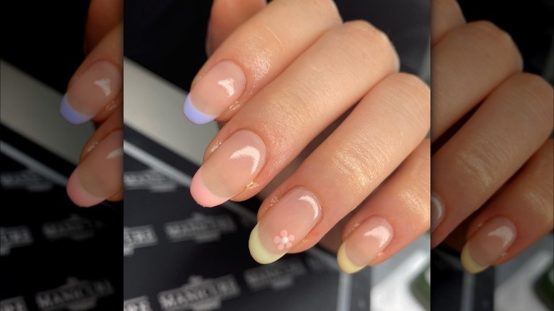 Pastel French manicure with flower design 