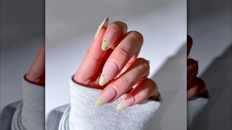 Pale yellow French manicure