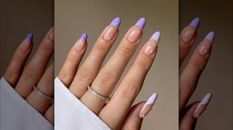 Purple French manicure nails with pearls