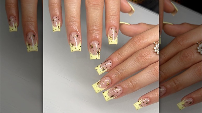 Yellow French manicure with sparkle details