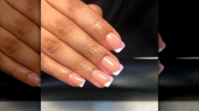 Two-toned white and lavender French tip nails