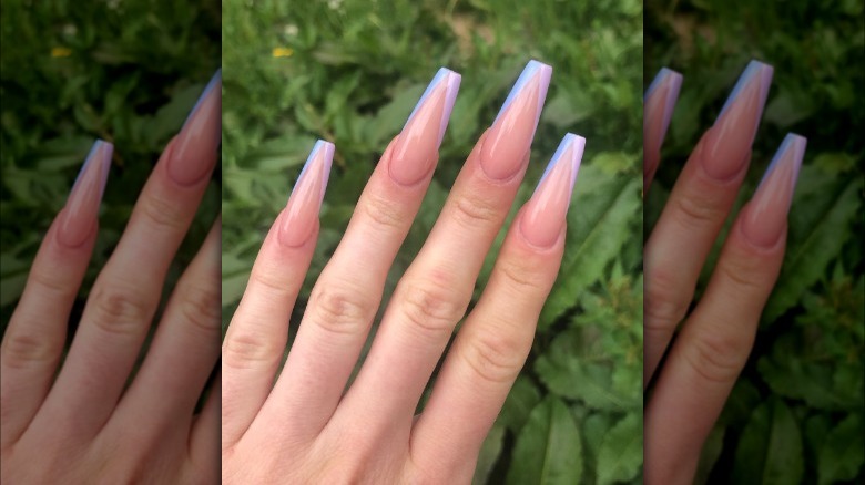 Long nails with V-shaped purple French tip