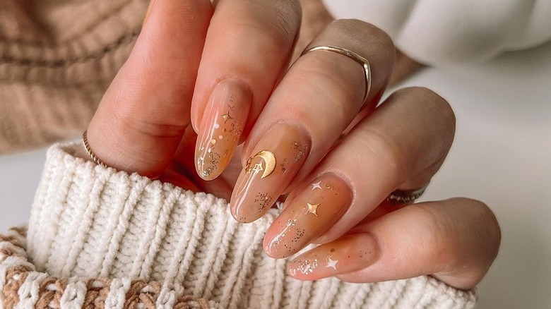 Nude and gold celestial mani