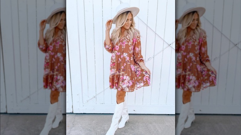 girl wearing brown floral dress and boots