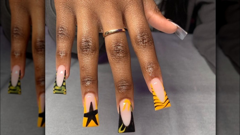 Duck nails with black and French yellow tips
