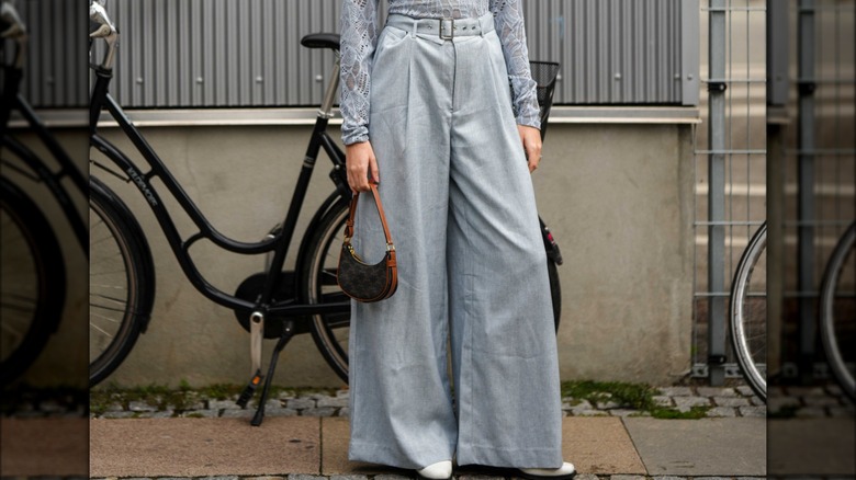 woman wearing dusty blue pants