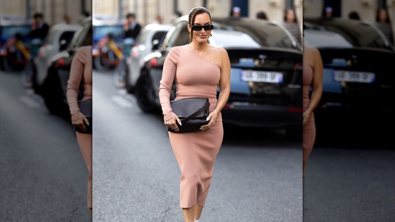 Woman wearing blush bodycon dress