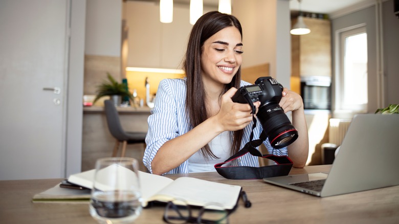 woman holding camera