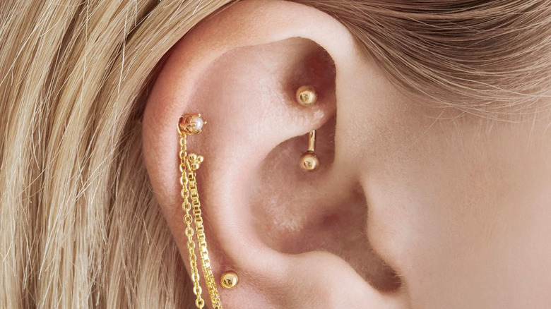 person with rook piercing