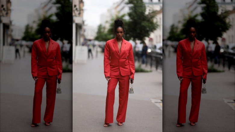 woman wearing red blazer and pants