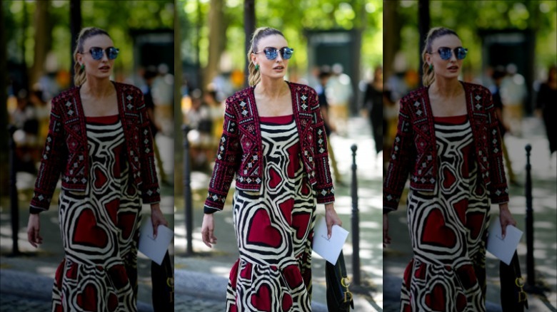 woman wearing red print dress