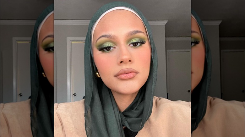 woman wearing green eyeshadow