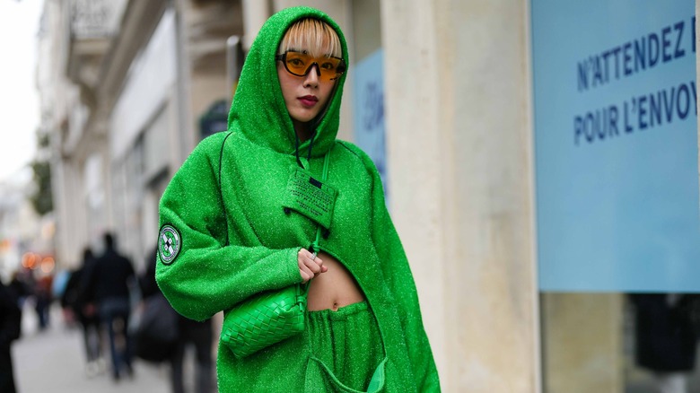 Woman in green outfit