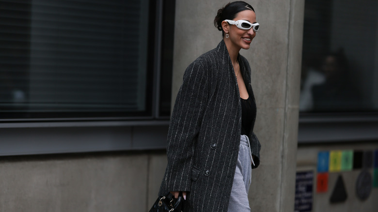 Woman in sweats and blazer 