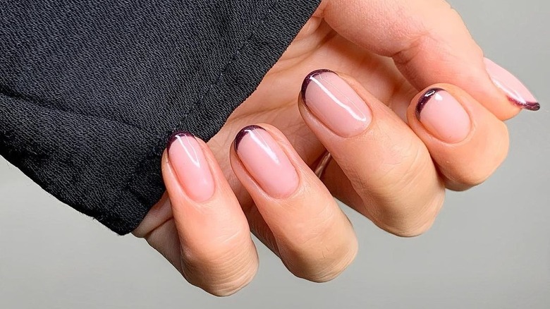 dark purple French tip manicure