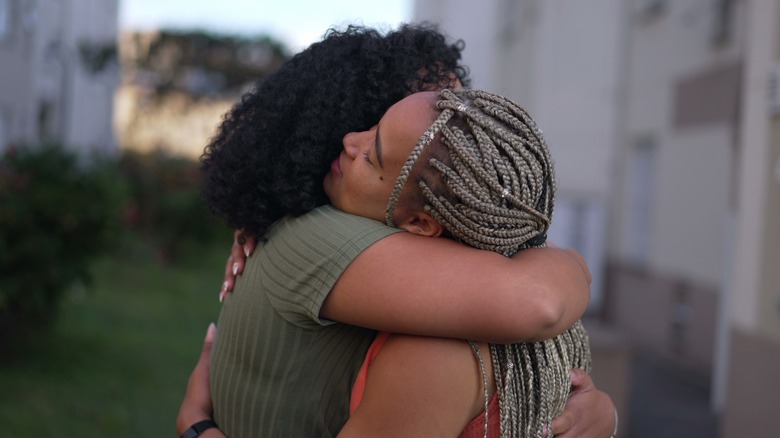 two women hugging