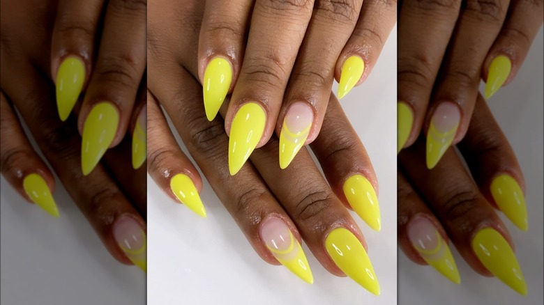 Bright yellow stiletto nails
