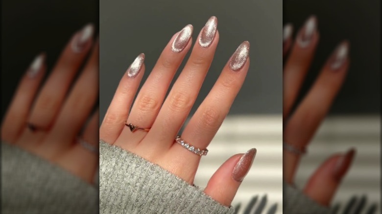 hand with cashmere nails