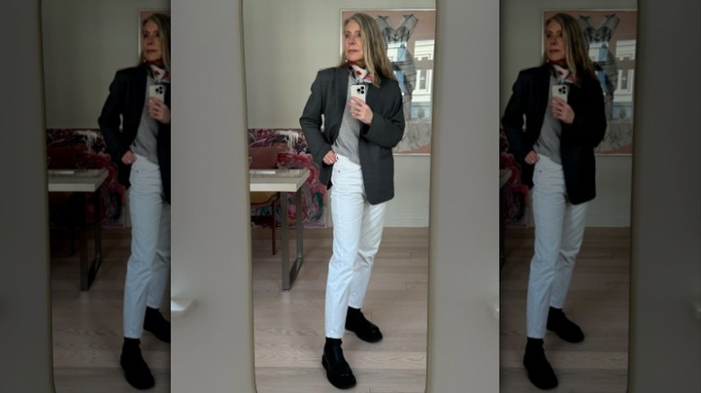 White jeans with black jacket