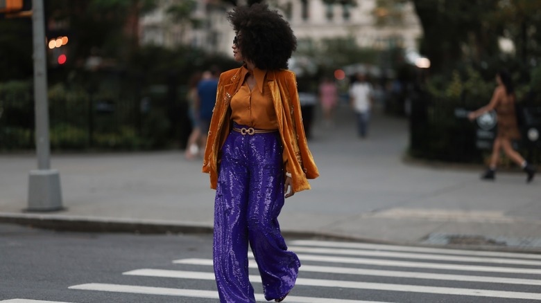 woman wearing sequined pants