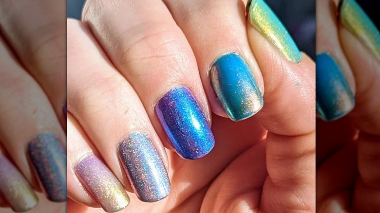 glittery blue paint chip fingernails