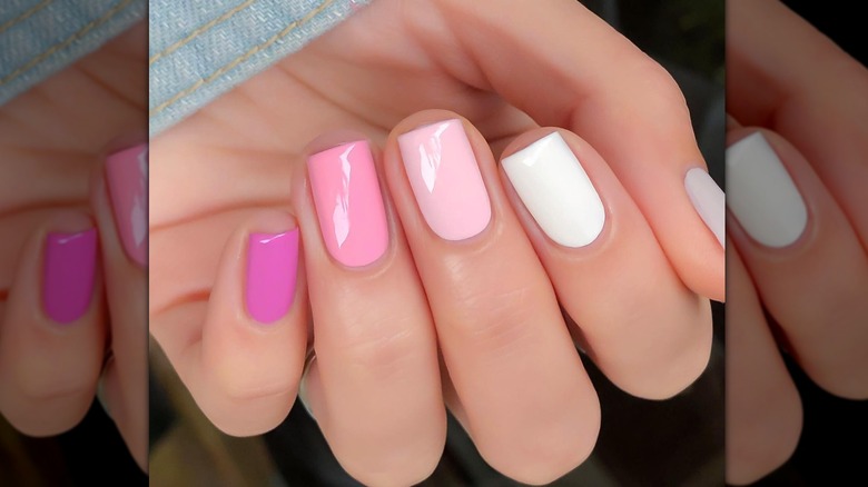 long pink paint chip fingernails