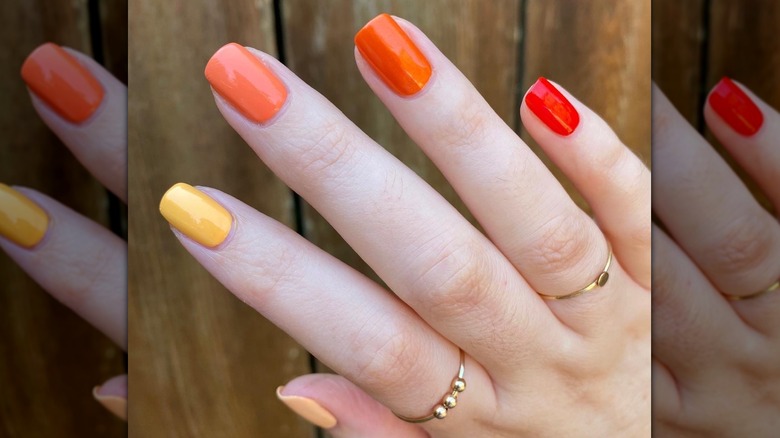 bright orange paint chip fingernails