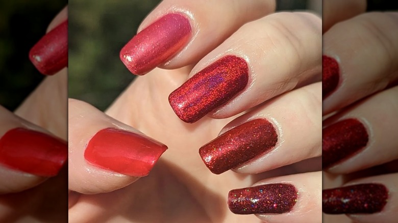 glittery red paint chip fingernails