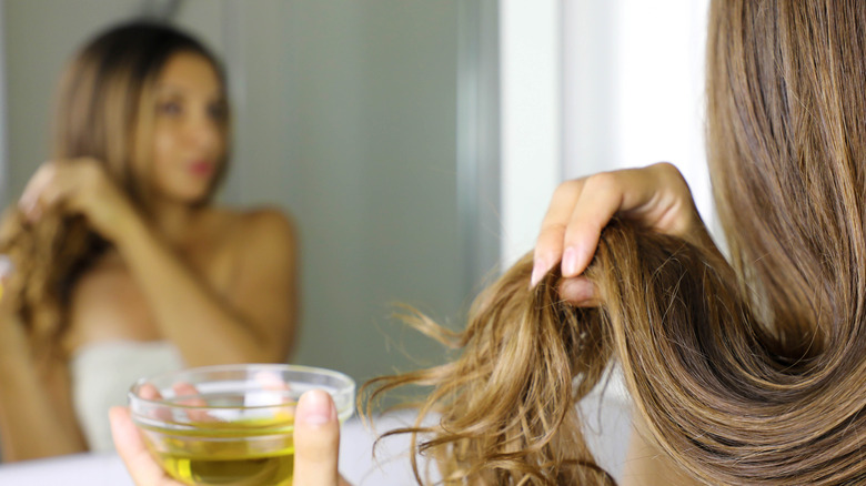 female hair oiling
