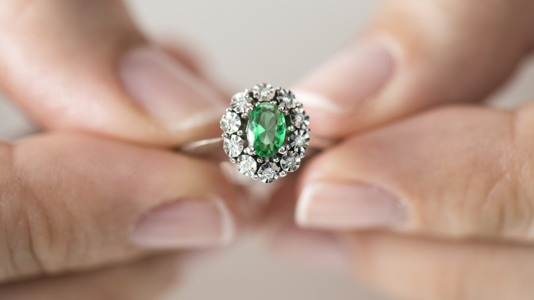 Diamonds framing emerald