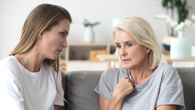 A woman listening to an older woman