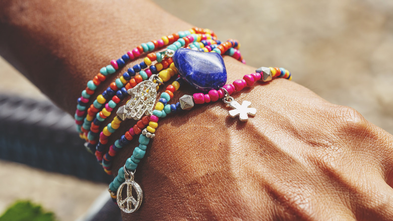 Wrist with beaded bracelets