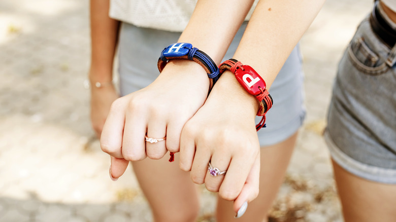 Friends with matching bracelets